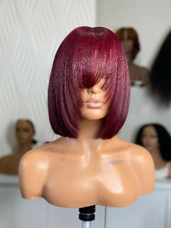 Colored wig with a purple - violet shade for a regal and elegant lookRiah