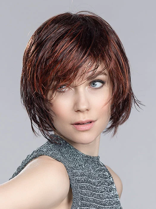 Bob wig with a curly fringe for a playful and youthful vibeBeam | Hair Power | Synthetic Wig