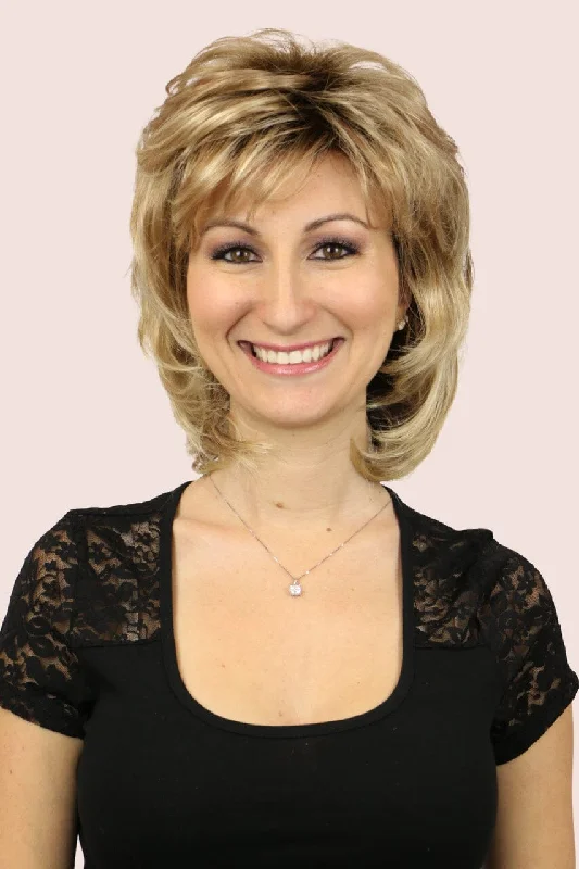 Wavy wig with a wispy fringe for a soft and feminine lookDawn  w/ Roots (medium wig)