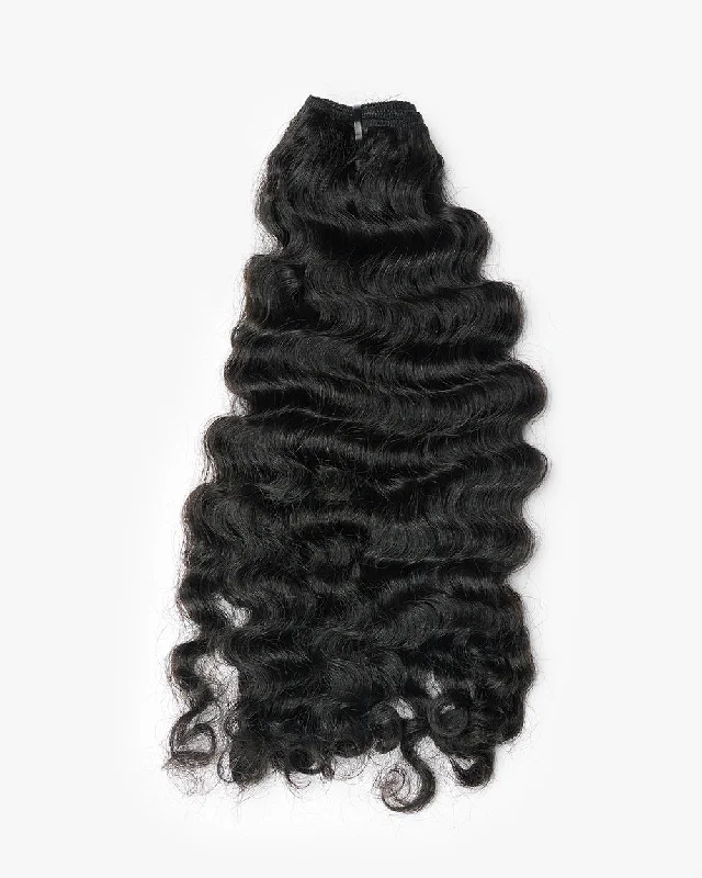 Curly wig with a pre - plucked hairline for a more natural lookLaos Wavy / Curly