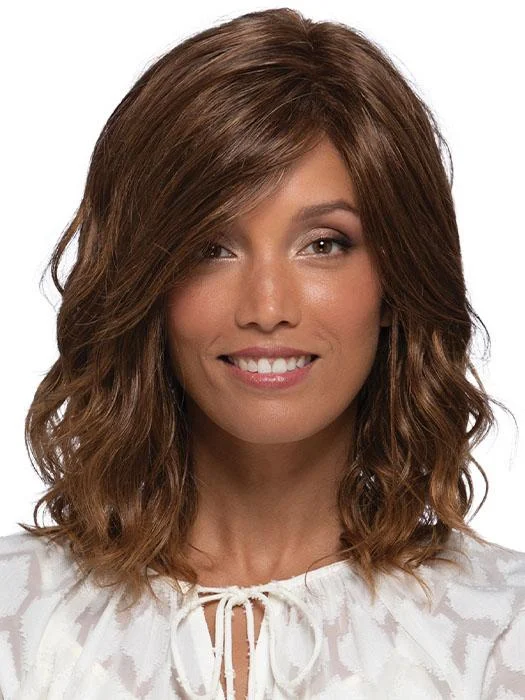 Wavy wig with a side - part for a more flattering lookPetite Berlin | Synthetic Lace Front Wig (Mono Part)